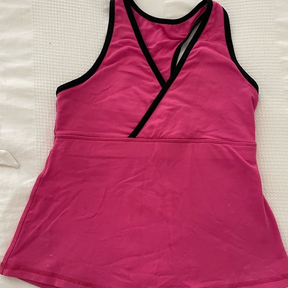 An assortment of Lululemon workout tops - Size 8 - Picture 5 of 8